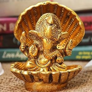 Golden Ganesh in shell sculpture