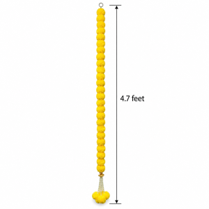 An artificial yellow marigold flower toran / hanging measuring approximately 4.7 feet long with a decorative hanging tassel at the bottom.